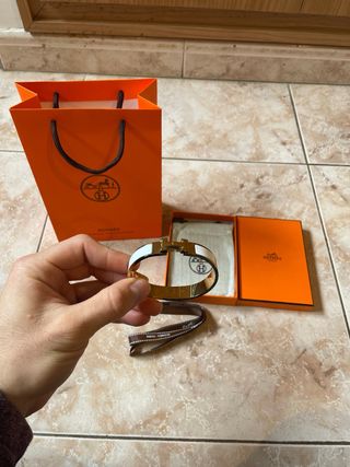 Pulsera Hermès Blanca y Dorada