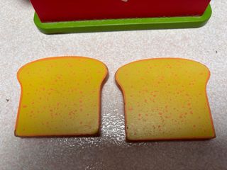 Tostador de madera de juguete