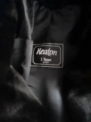 Abrigo de pelo negro