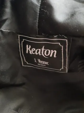 Abrigo de pelo negro