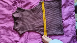 Top smanicato a righe