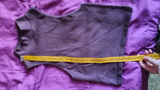 Top smanicato a righe