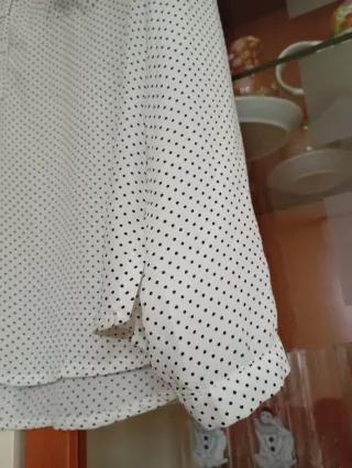 Blusa estampada manga larga