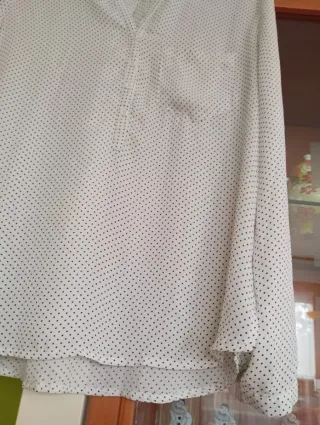 Blusa estampada manga larga