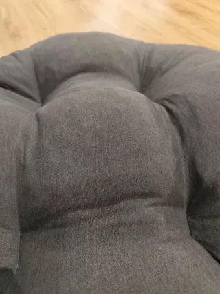 Cojín redondo gris de tela