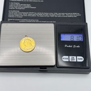 Colgante moneda de oro 22kt