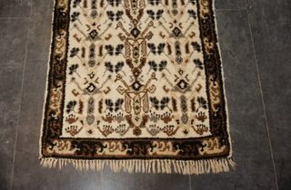 Antigua alfombra bereber hecha a mano.Lana/algodón