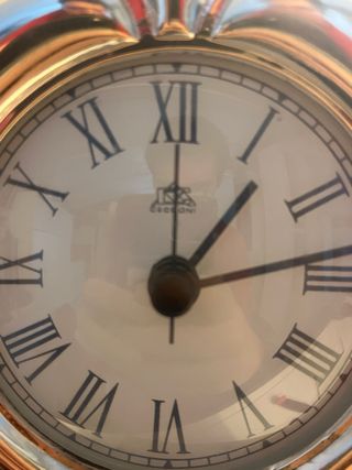 Reloj de péndulo antiguo de plata