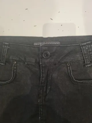 Falda vaquera negra con flecos