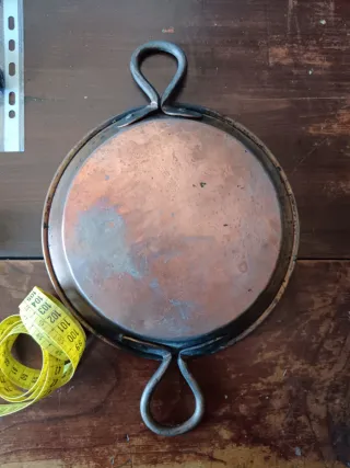 Pentola in rame con manici