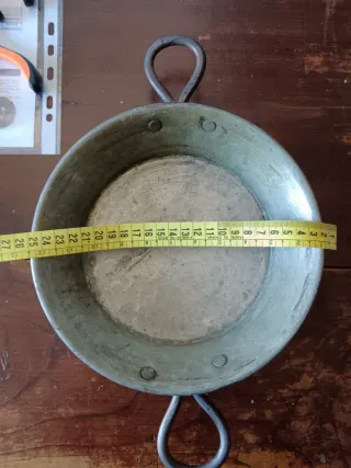 Pentola in rame con manici