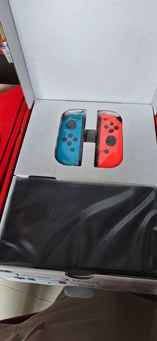 Nintendo Switch OLED Azul y Rojo Nueva