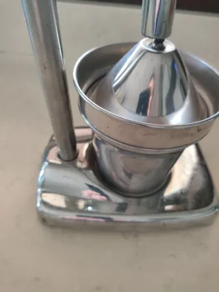 Exprimidor de palanca.