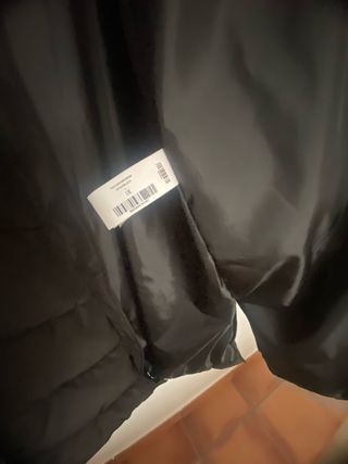 Plumífero largo negro