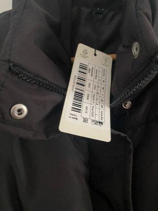 Plumífero largo negro