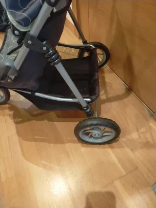 Cochecito gemelar gris