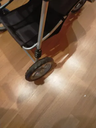 Cochecito gemelar gris