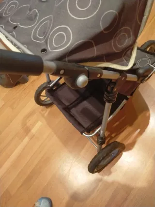 Cochecito gemelar gris