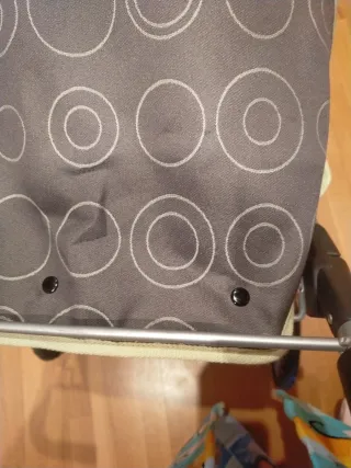 Cochecito gemelar gris