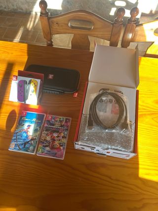 Nintendo Switch + Giochi e Accessori Anno 2024