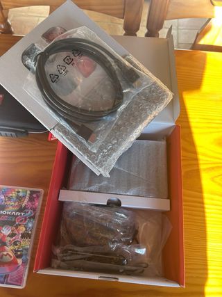 Nintendo Switch + Giochi e Accessori Anno 2024