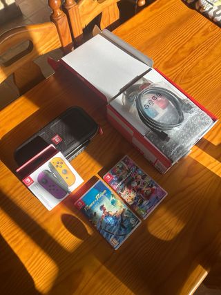 Nintendo Switch + Giochi e Accessori Anno 2024