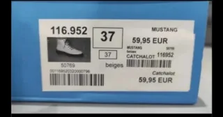 Botas de piel beige y negras