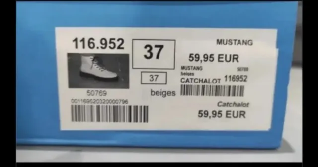 Botas de piel beige y negras