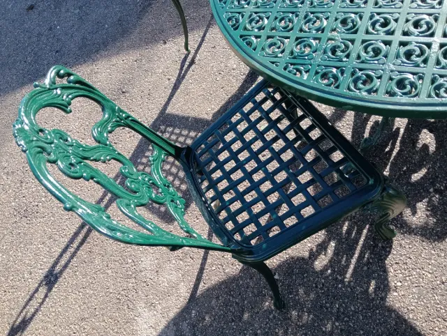 Conjunto mesa y sillas exterior fundición