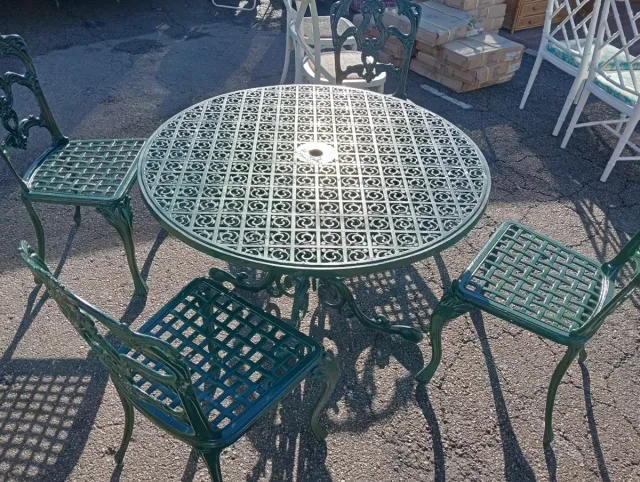 Conjunto mesa y sillas exterior fundición