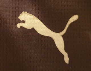 Conjunto deportivo Puma hombre morado y amarillo