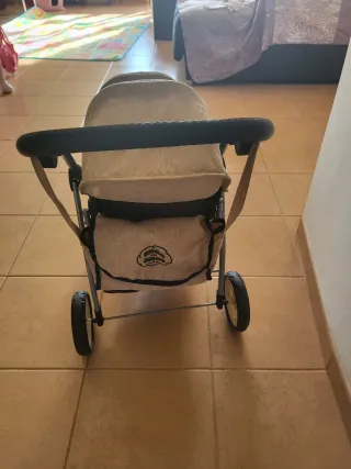 Cochecito gemelar de juguete