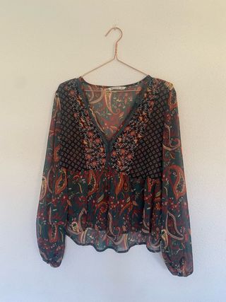 Blusa estampada manga larga