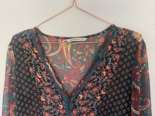 Blusa estampada manga larga