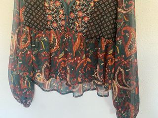 Blusa estampada manga larga