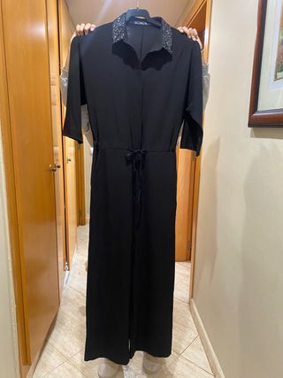 Mono negro fiesta con pedrería