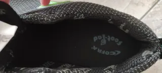 Zapatos de seguridad negros y verde