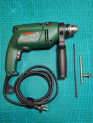 Taladro/percutor BOSCH PSB 600-2 + maletín +brocas