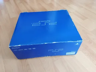 Playstation 2 con scatola e accessori.