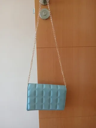 Bolso de mano azul para eventos