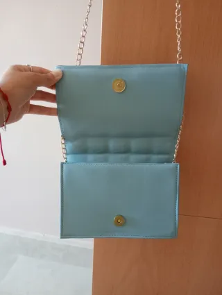 Bolso de mano azul para eventos