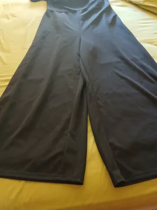 Mono negro elegante para fiesta Nuevo