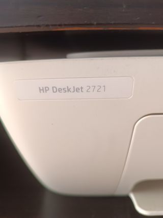 Impresora HP azul y blanca