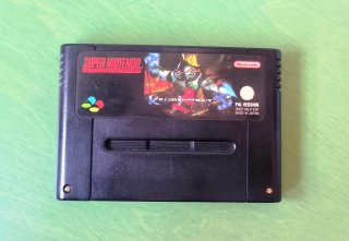 Consola Super Nintendo SNES con juego.