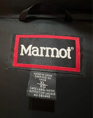 Chaqueta alta montaña Marmot roja y negra