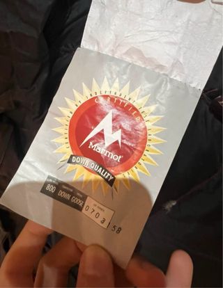 Chaqueta alta montaña Marmot roja y negra