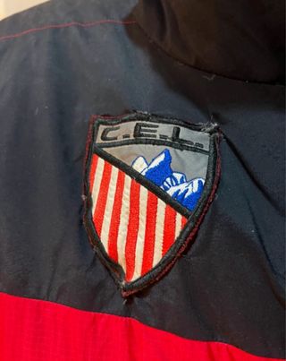 Chaqueta alta montaña Marmot roja y negra