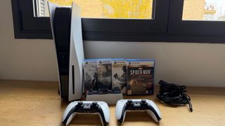 Console Playstation 5 + 2 controller + 4 giochi