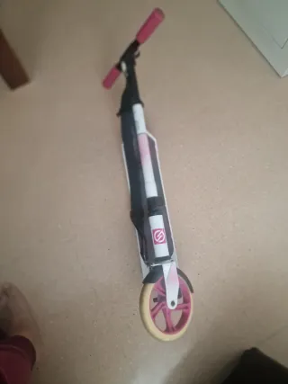 Monopatín Oxelo Mid 7 rosa