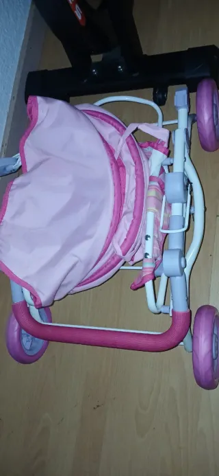 Carrito de muñecas rosa
